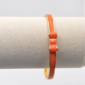 Kate Spade New York Skinny Mini Bow Enamel Bangle - Gold & Coral/Orange